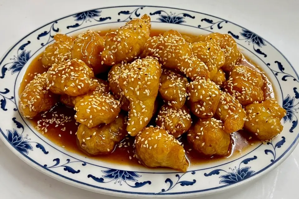 Sesame Chicken - Crispy chicken with sesame seeds in savory glaze at Lucky Star Chinese Restaurant in North Bend